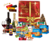 Cesta de Natal Rubi em caixa de papelão kraft decorada, com panetone com frutas 400g, panetone com gotas de chocolate 400g e outros produtos saborosos.