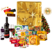 Cesta de Natal Esmeralda em caixa de papelão kraft decorada com 38 itens, incluindo panetone de frutas 400g, panetone com gotas de chocolate 400g, vinho tinto e suco de uva.